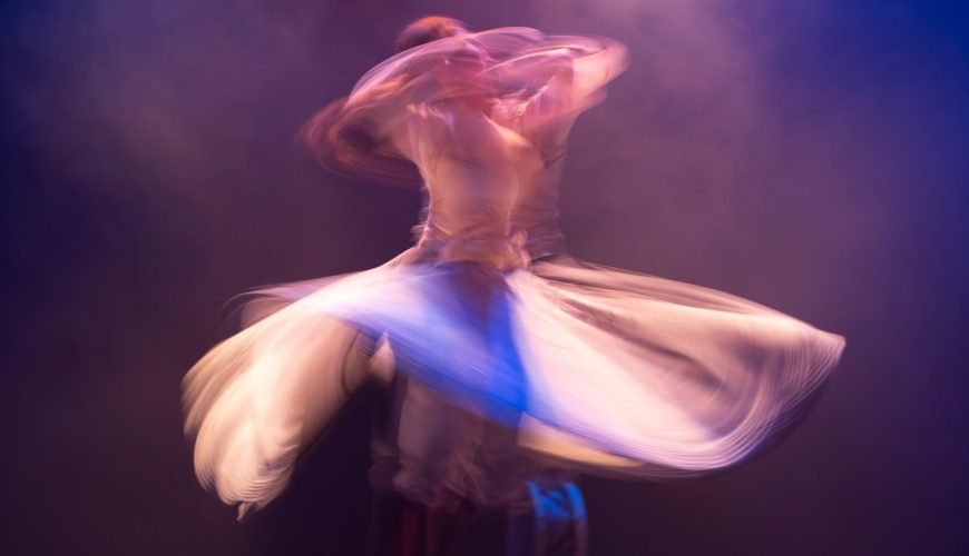 woman in white long sleeve shirt with white scarf